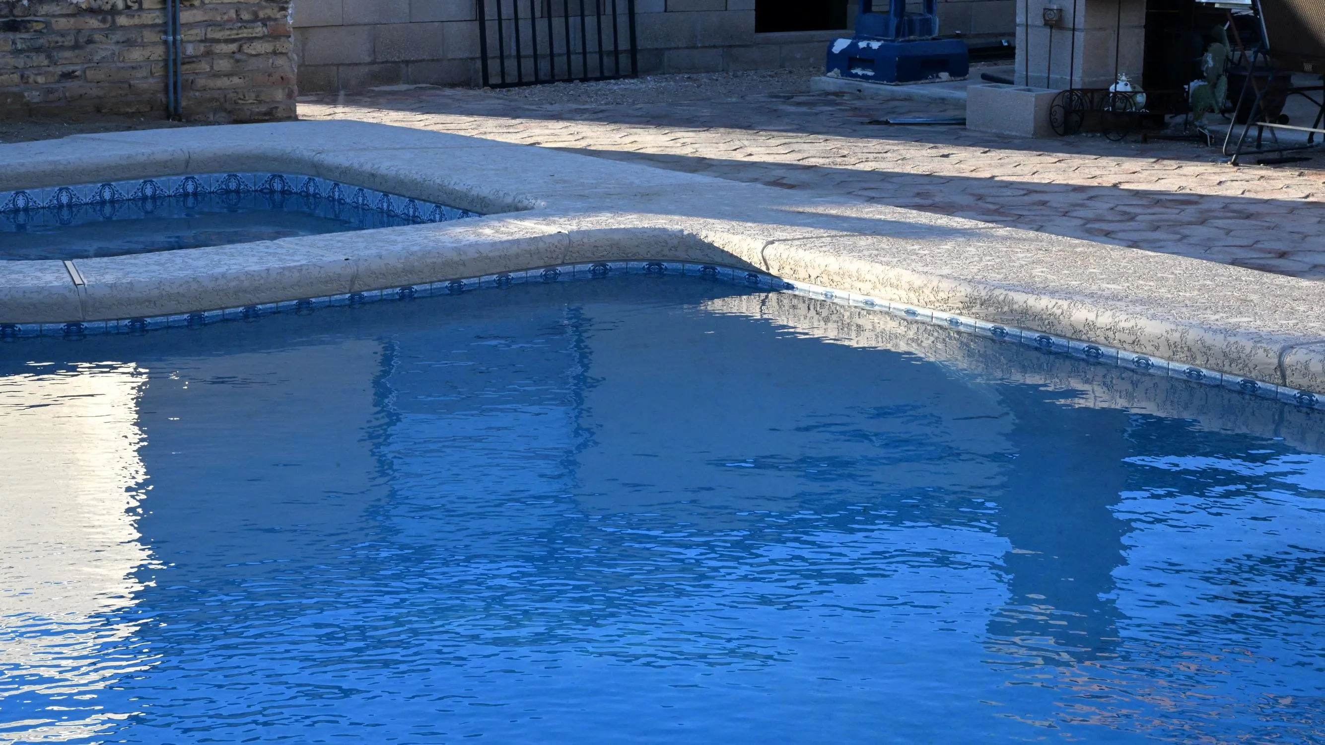 Sorce Signature Outdoors backyard pool installation with stone decking